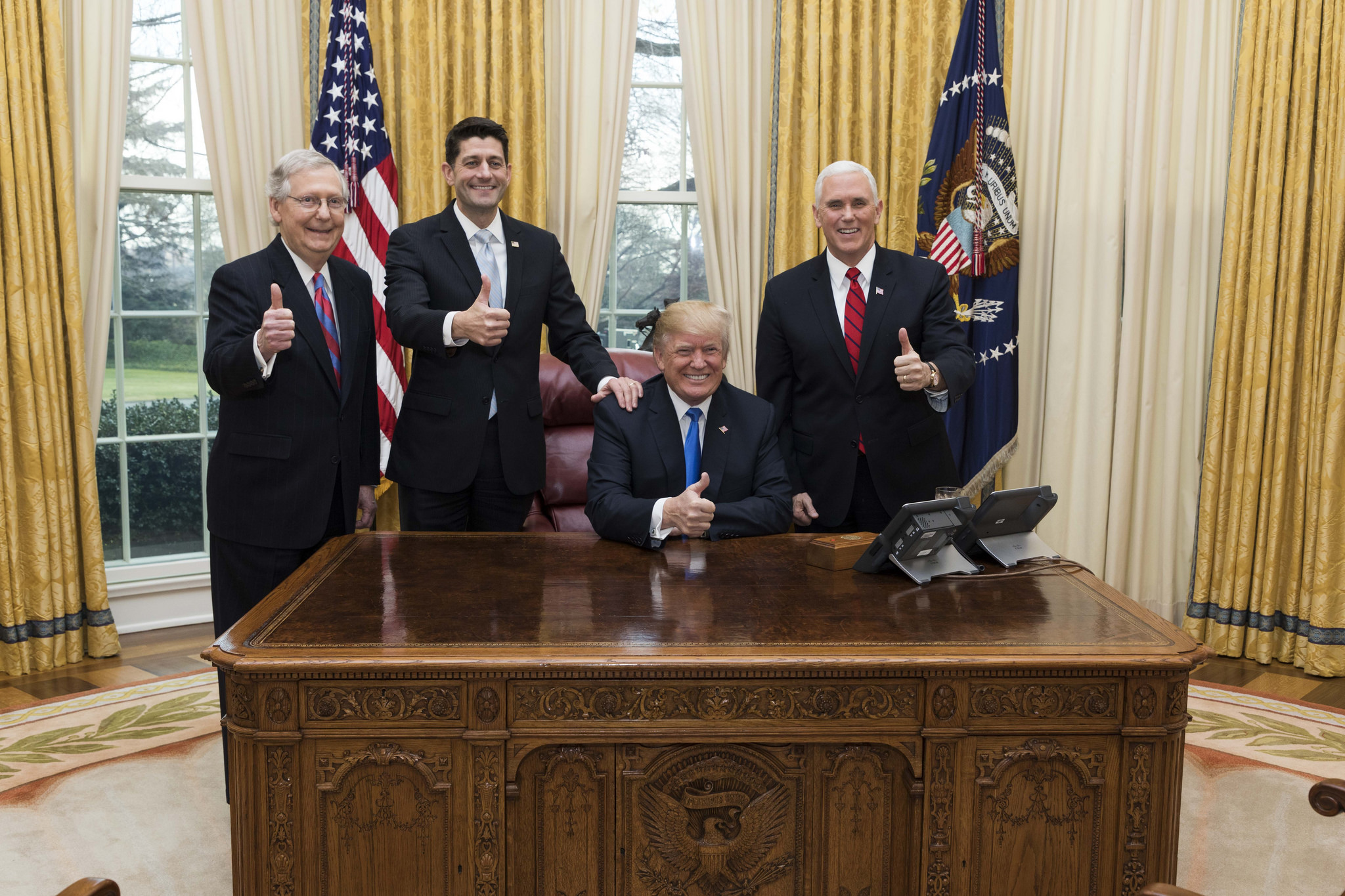 trump, mitch mcconnell, paul ryan, and mike pence, celebrating tax cuts