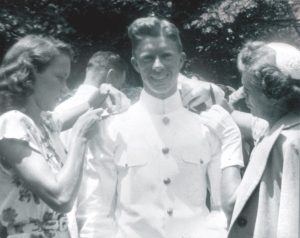 Carter at his 1946 graduation from the Naval Academy, with his then fiancée, Rosalynn (left), and mother, Lillian Carter (right). (National Archives)