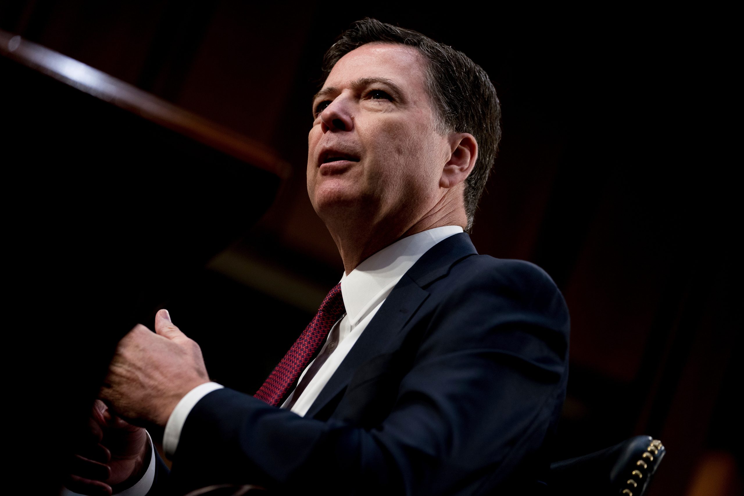 Justice Department Sues Colorado Over Gun Laws, Indicts James Comey